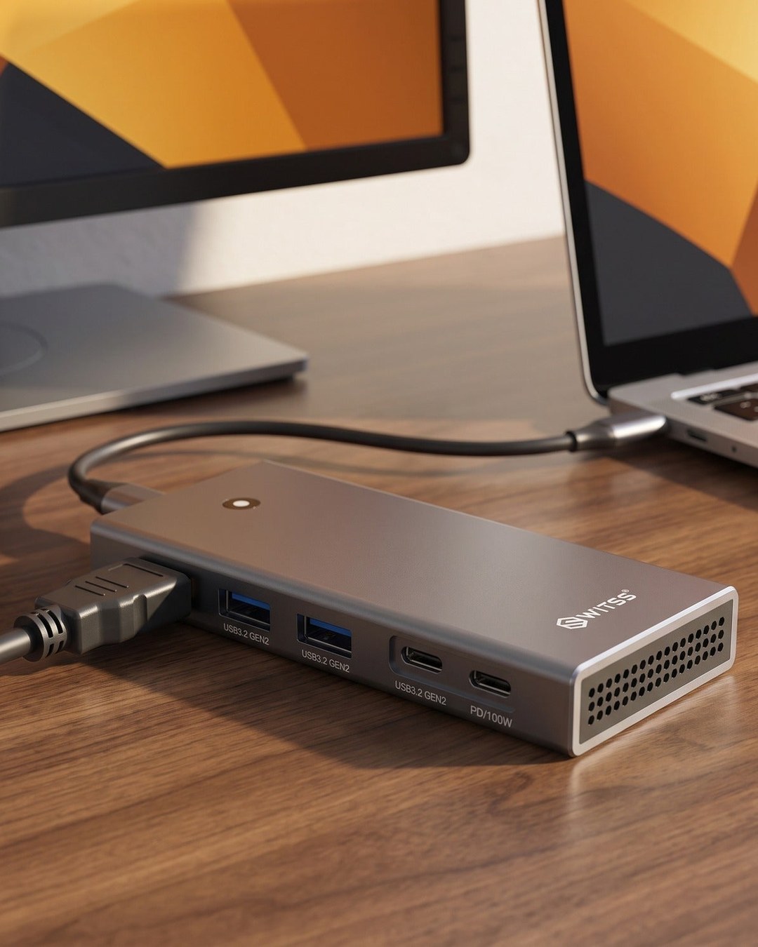 Station d'accueil 5-en-1 Switss® reliant un ordinateur portable et un écran avec un seul câble USB-C