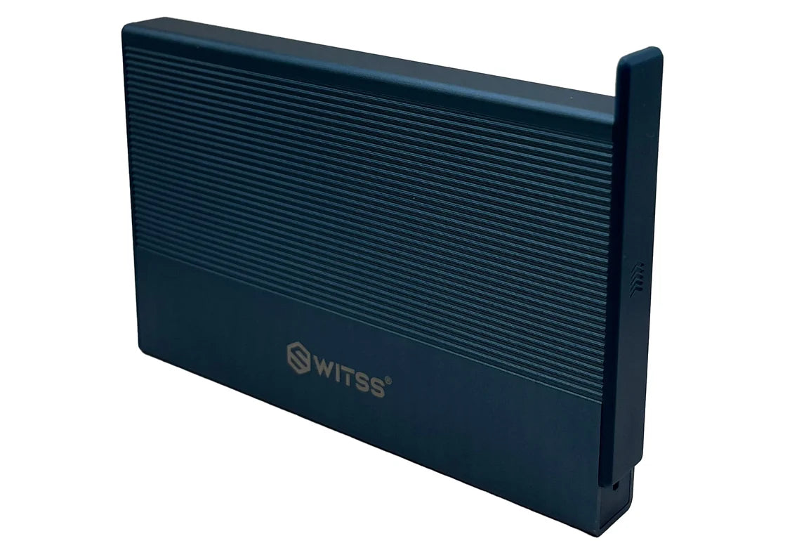 The enclosure standing upright with the cover of the short side taken off and placed next to it