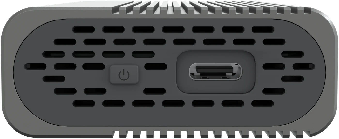 Front of the enclosure: the power button and the USB-⁠C port in the front cap, with cooling fins above and below