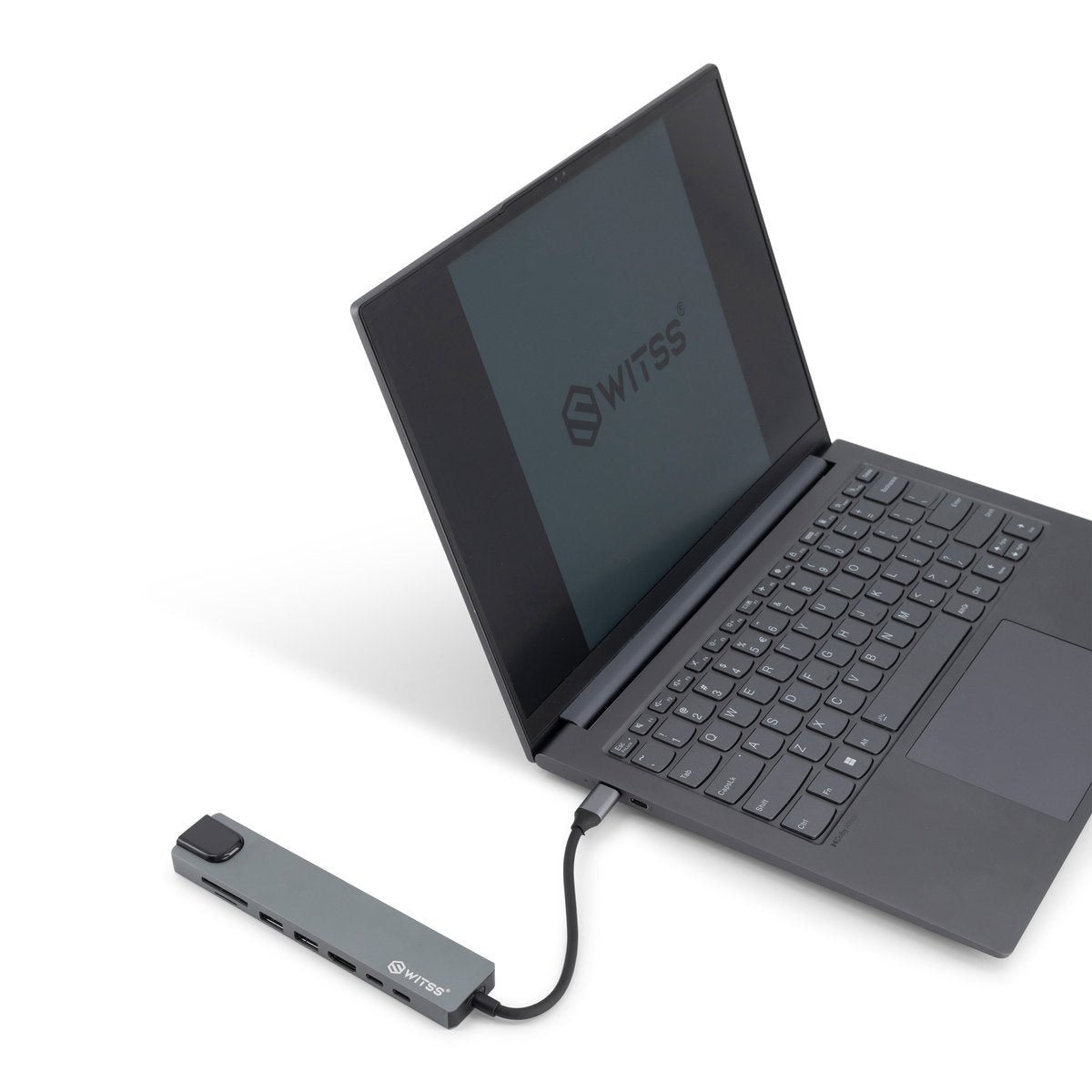 Switss® 8-in-1 USB-C hub connected to a laptop on a desk, ready to use without software